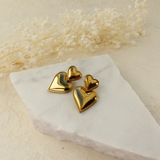 Doppelherz-Ohrringe in Gold und Silber