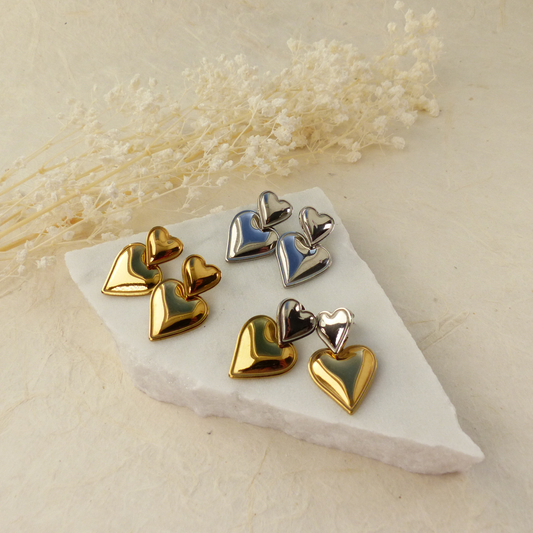 Doppelherz-Ohrringe in Gold und Silber