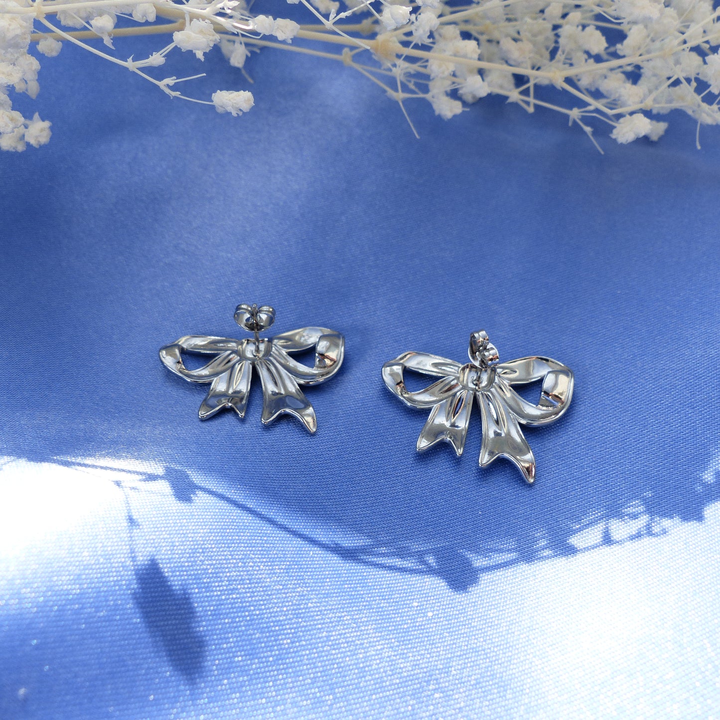 Silberne Schleifenohrringe Stecker