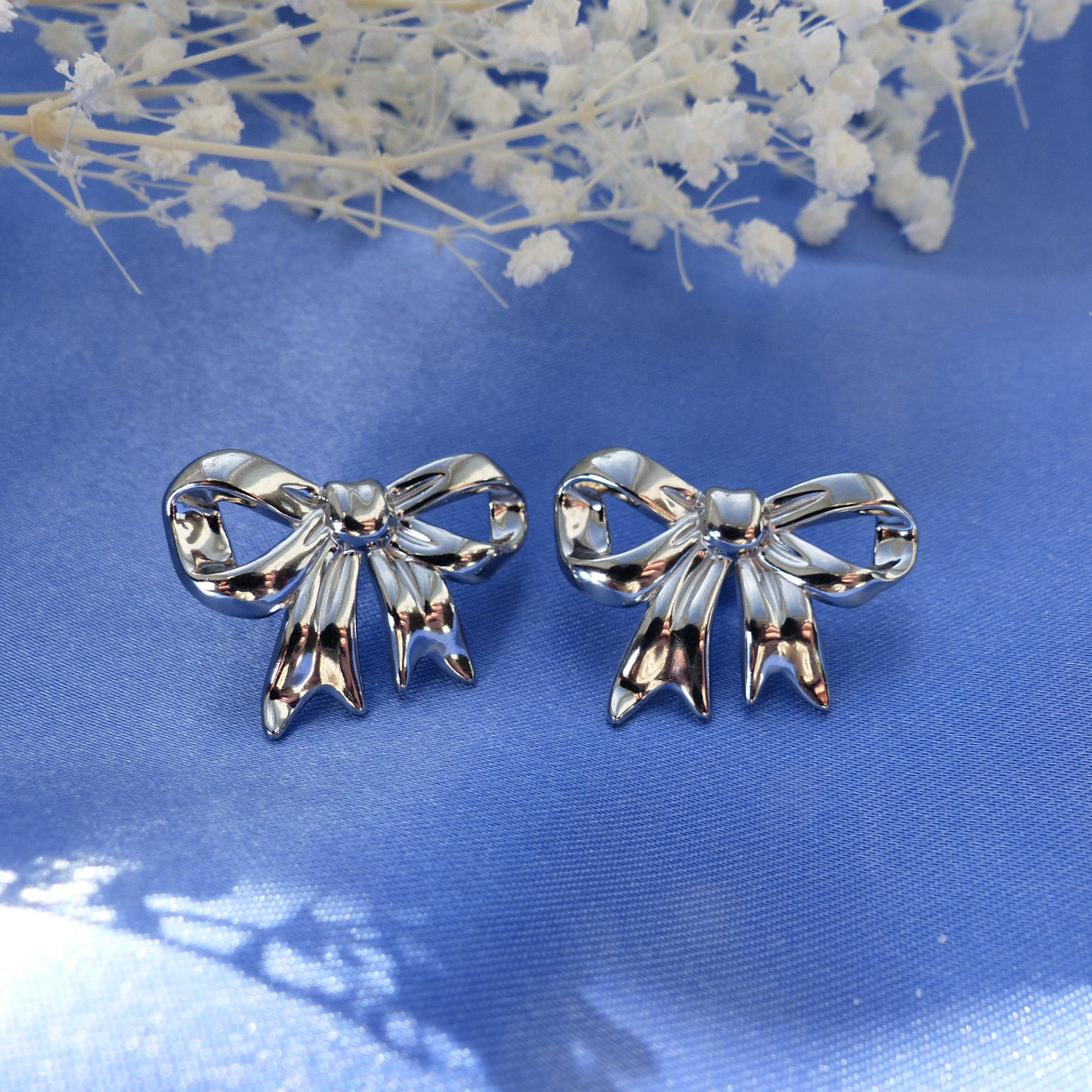 Silberne Schleifenohrringe Stecker