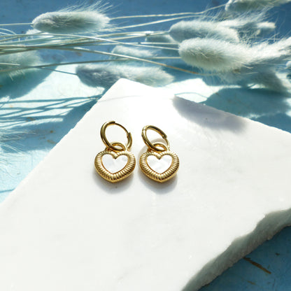 Herzförmige Ohrringe in Gold und Silber mit Wechselseite aus Edelstahl