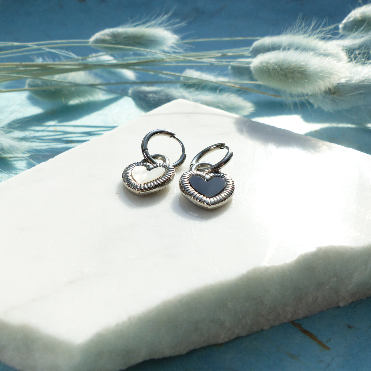 Herzförmige Ohrringe in Gold und Silber mit Wechselseite aus Edelstahl