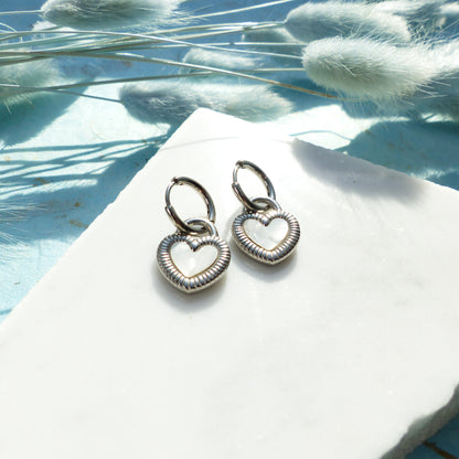 Herzförmige Ohrringe in Gold und Silber mit Wechselseite aus Edelstahl