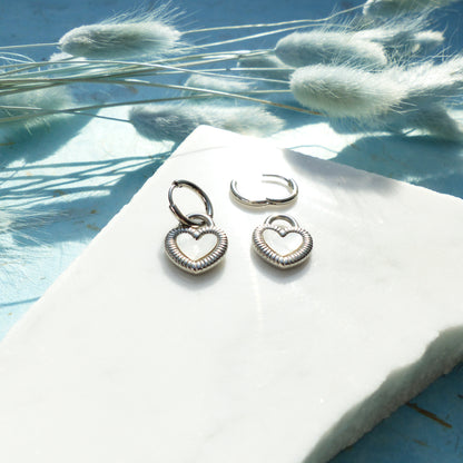 Herzförmige Ohrringe in Gold und Silber mit Wechselseite aus Edelstahl